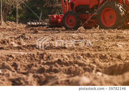 Grader leveling landfill on construction site Grader leveling landfill on construction site 39782146