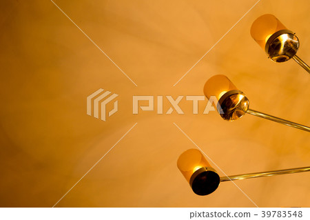 a part of modern chandelier on the ceiling 39783548