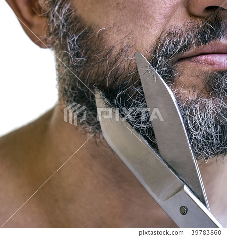 Cutting beard using big old scissors Cutting beard using big old scissors 39783860