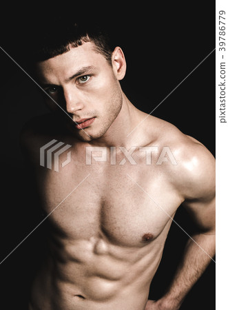 Uninterested man with attractive body 39786779