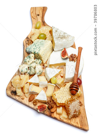 Camembert cheese with honey, figs, walnuts on Camembert cheese with honey, figs, walnuts on 39786803