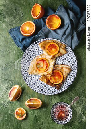 Pancakes with bloody oranges 39787362