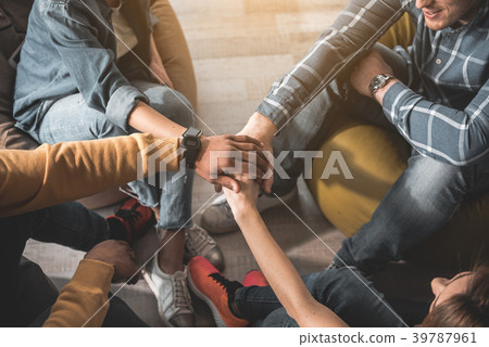 Group of people pulling together for common aim Group of people pulling together for common aim 39787961