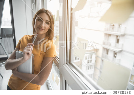 Smiling lady having mental break from work 39788188