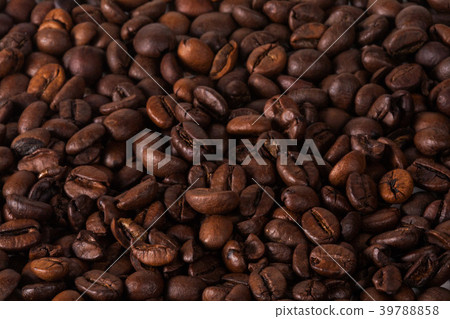Coffee cup and beans on old kitchen table. Top Coffee cup and beans on old kitchen table. Top 39788858