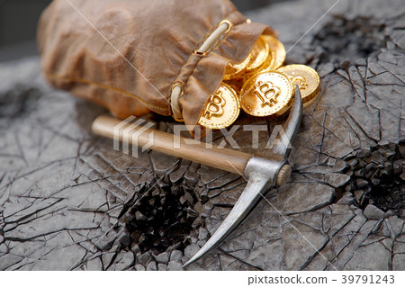 Bitcoin mining concept with pickaxe and leather 39791243