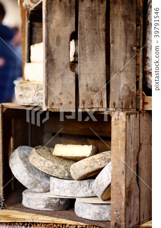cheeses and home made sausages on market  39791546