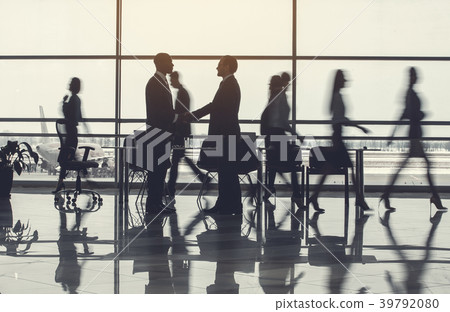 Satisfied workers greeting with each other Satisfied workers greeting with each other 39792080