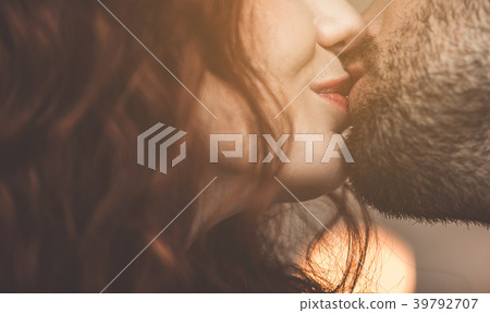 Affectionate couple kissing with love 39792707