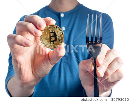 Man holding a Bitcoin on a white background 39793010