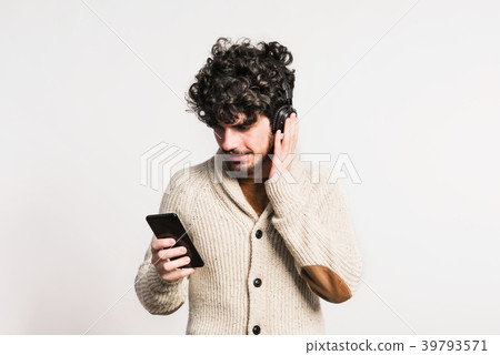Portrait of a young man with smartphone and Portrait of a young man with smartphone and 39793571