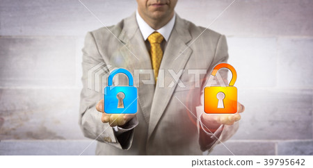 IT Manager Showing A Locked And An Open Padlock 39795642