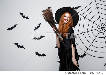 Halloween Witch Concept - Portrait of beautiful Halloween Witch Concept - Portrait of beautiful 39799232