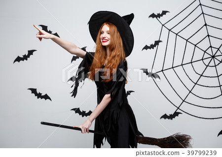 Halloween Concept - Happy elegant witch enjoy Halloween Concept - Happy elegant witch enjoy 39799239
