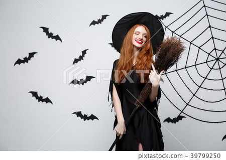 Halloween Witch Concept - Portrait of beautiful Halloween Witch Concept - Portrait of beautiful 39799250