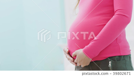 close up pregnant women belly close up pregnant women belly 39802671
