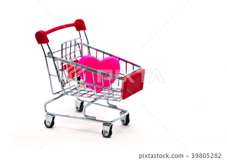 Pink heart in a shopping cart isolated on white 39805282
