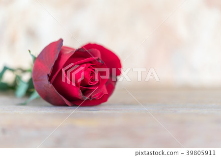 Red rose flower on wooden floor in Valentine's Day Red rose flower on wooden floor in Valentine's Day 39805911