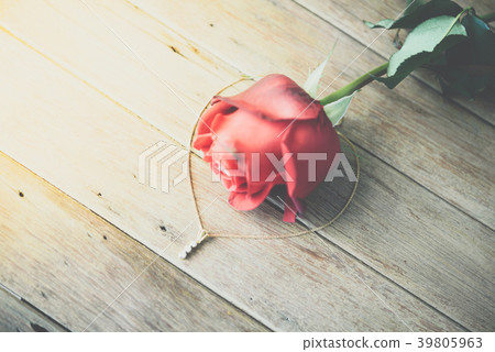 Red rose flower on wooden floor in Valentine's Day Red rose flower on wooden floor in Valentine's Day 39805963