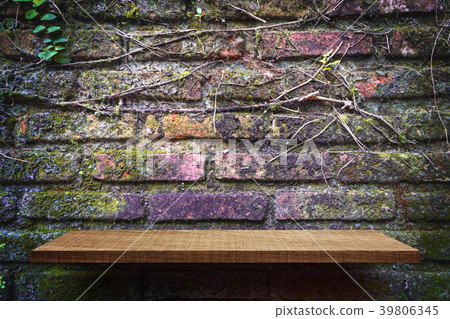 empty shelf product display on garden brick wall 39806345
