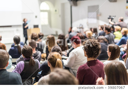 Woman giving presentation on business conference. 39807067
