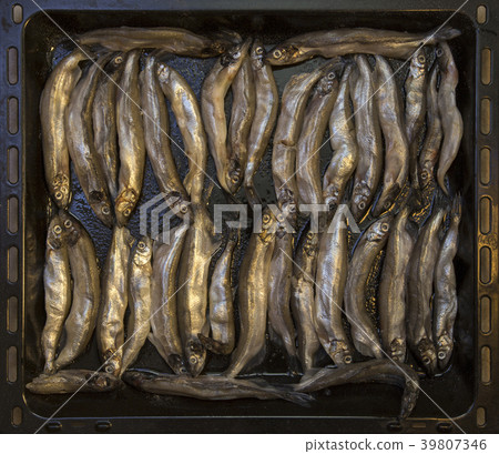 Frying pan with capelin before frying 39807346