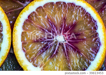round slices of red orange, background and texture round slices of red orange, background and texture 39813453