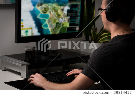 Gaming game play video on tv or monitor.  39814432