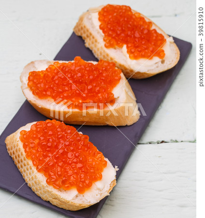 Photography of sandwiches with caviar 39815910