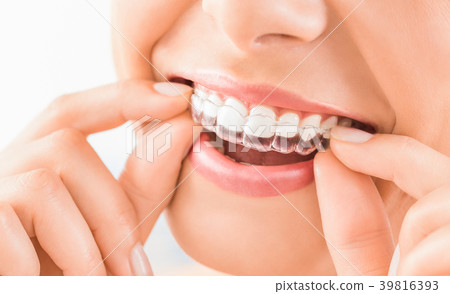 Beautiful smile and white teeth of a young woman. 39816393