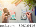 Designer drawing website ux app development. 39816416
