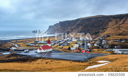 Beautiful Red Church and Vik village, Iceland. 39820300