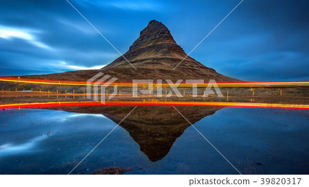Kirkjufell mountains and reflection with car light 39820317