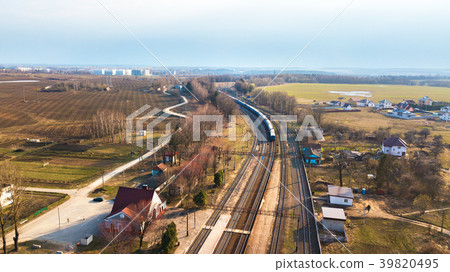 Train passing to distance. Aerial view of railway 39820495