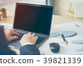 businessman working laptop with chart paper graph 39821339