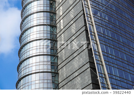 modern blue glass wall of office building 39822440