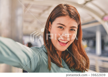 Business Communication Concepts, A young business woman is playi 39822839