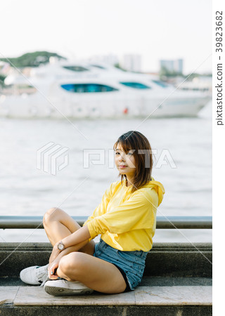 Lifestyle series: Young Asian woman in summer park 39823682