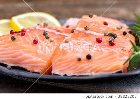 Raw Salmon Fish Fillet with Lemon and Fresh Herbs Raw Salmon Fish Fillet with Lemon and Fresh Herbs 39825205