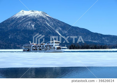 Tourist boat going through the ice zone Lake Akan Tourist boat going through the ice zone Lake Akan 39826614