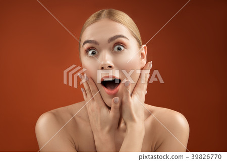 Blonde woman touching her soft pelt 39826770