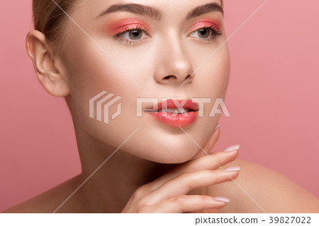 Calm woman showing her treated face 39827022