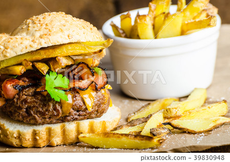 Beef burger with bacon, cheddar, homemade fries 39830948