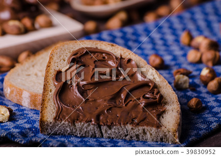 Healthy bread with Chocolate spread and nuts 39830952