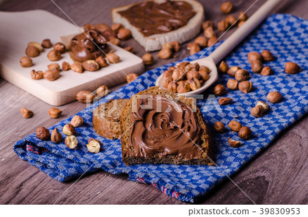 Healthy bread with Chocolate spread and nuts 39830953