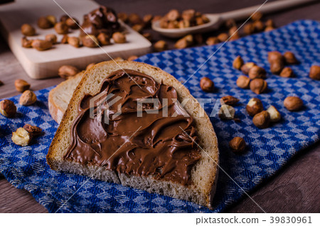 Healthy bread with Chocolate spread and nuts 39830961