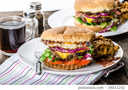 Beef burger, red onion and fried egg 39831202