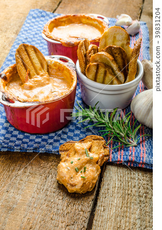 Tomato and cheese dip baked with crispy garlic toast Tomato and cheese dip baked with crispy garlic toast 39831204