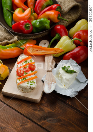 Healthy baguette, spread curd cheese with vegetable and herbs Healthy baguette, spread curd cheese with vegetable and herbs 39831664