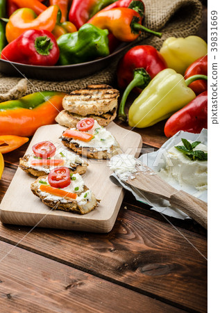 Healthy baguette, spread curd cheese with vegetable and herbs Healthy baguette, spread curd cheese with vegetable and herbs 39831669